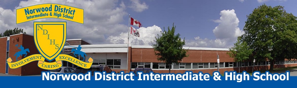 Front of school building with school name